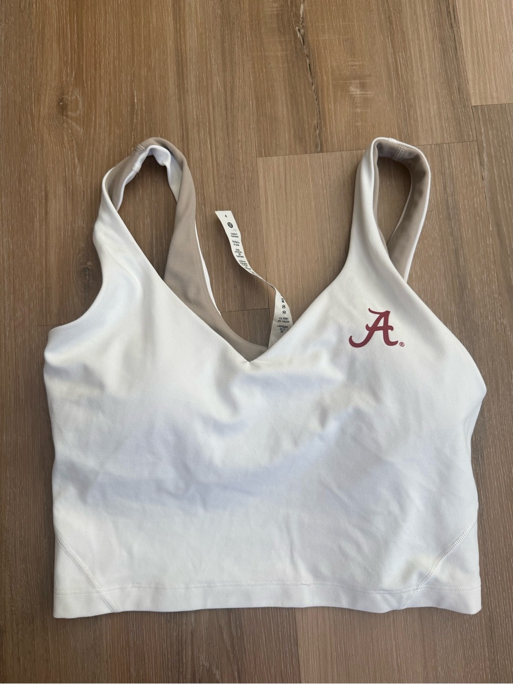 Lululemon sports bra - with university of Alabama logo purchased on campus